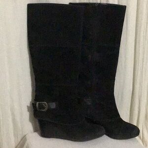 Black wedge knee high boots